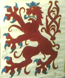 Bergischer Löwe, "blau bewehrt, bezungt und gekrönt" (auf einem Wimpel im Dom zu Altenberg )